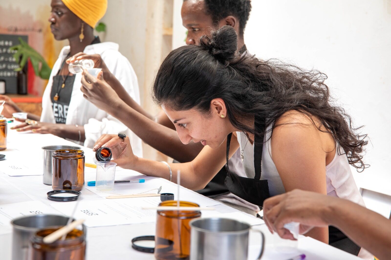 Guests blending fragrances at a Sere candle-making workshop